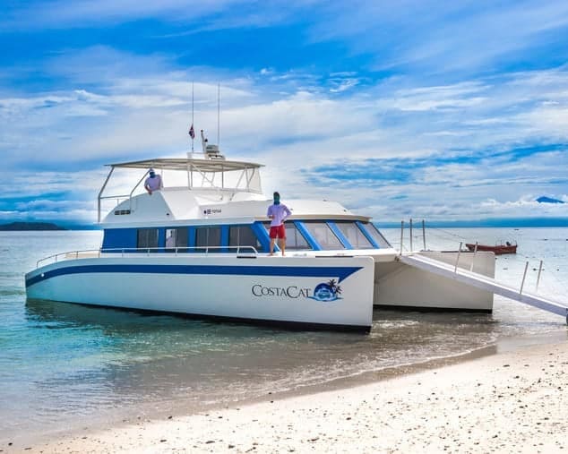 Catamaran anchored near the shore of Tortuga Island